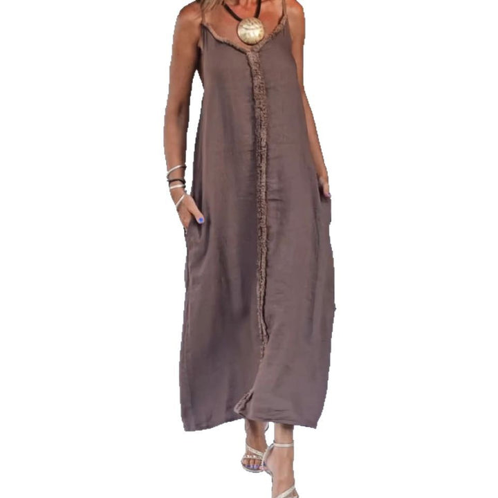 Women's airy linen-look maxi strap dress with fringed center seam and inset pockets Mune Fashion