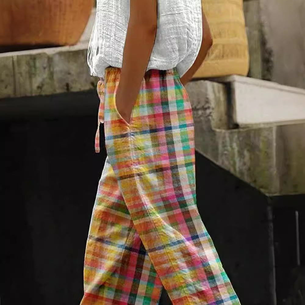 Women's checked linen trousers in palazzo cut with elastic tunnel drawstring waistband and rolled ankle hem Mune Fashion