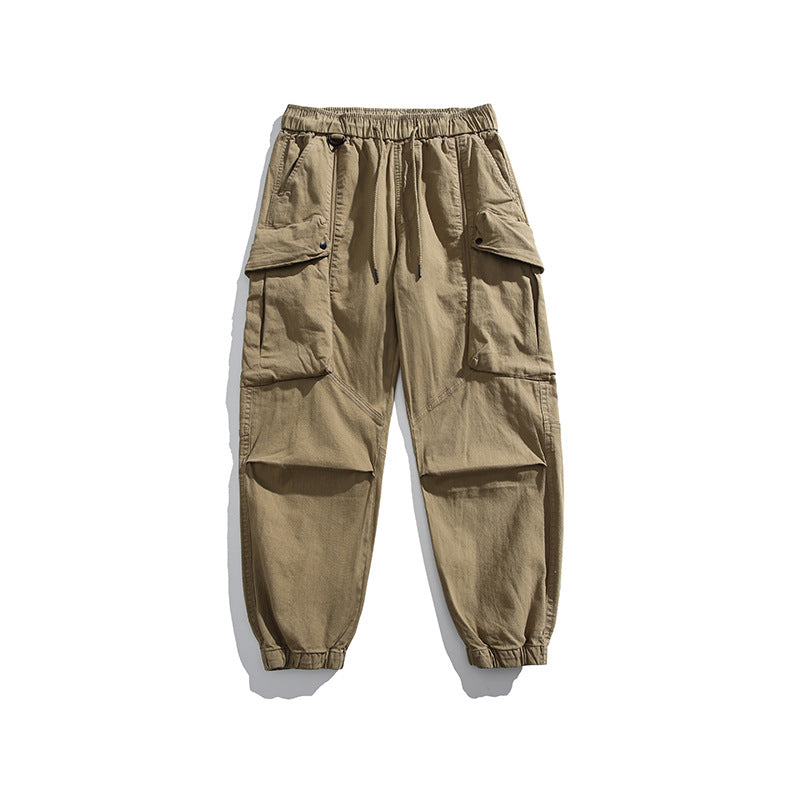 Men's utility cargo pants with elastic waistband, multiple pockets, and elastic cuffs.