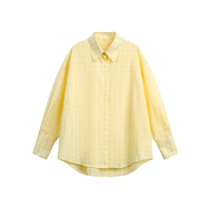 Women's oversized blouse with fine check pattern, drop shoulder and extended back part.