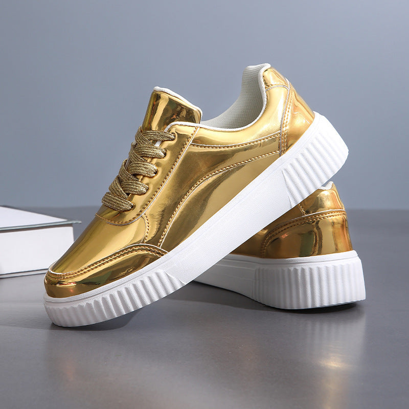 Ladies' low-cut sneakers with reflective patent upper, padded shaft, and raised outsole with groove profile Mune Fashion