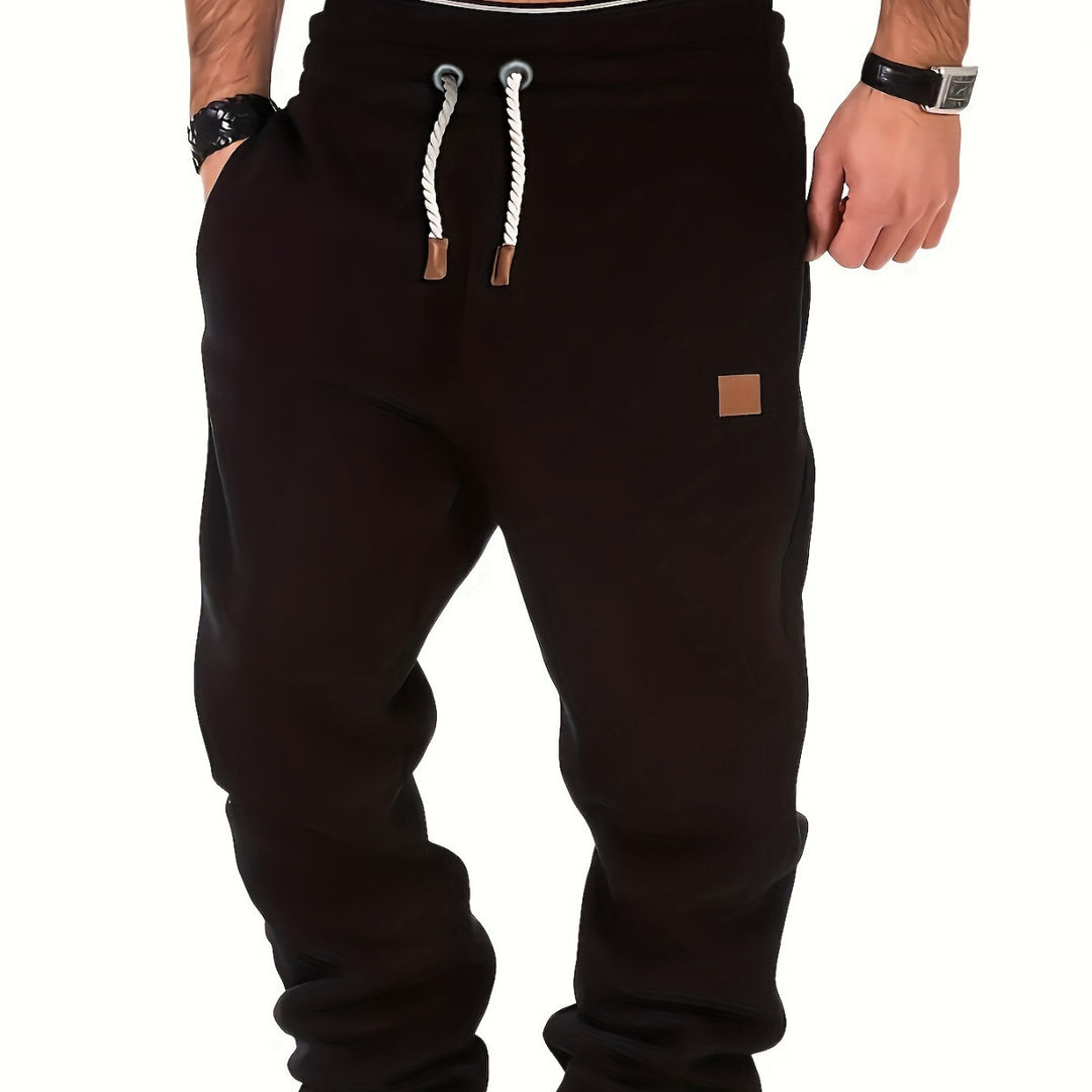 Men's mélange Relax Jogger with wide comfort waistband, twisted drawstring, and ribbed ankle cuffs Mune Fashion