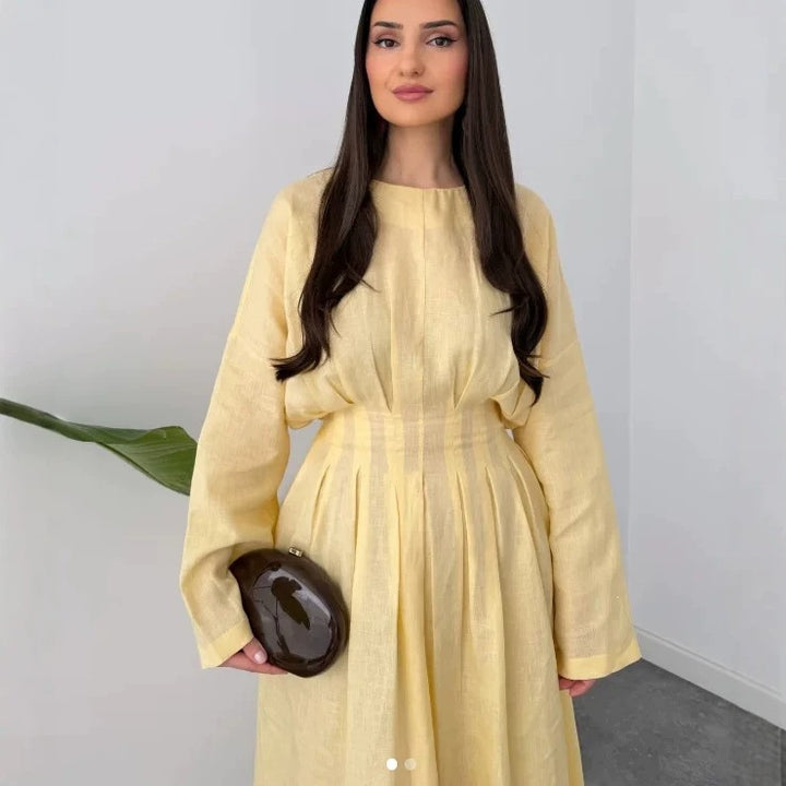 Ladies max dress with pleated bodice pleats, wide skirt and long bell sleeves Mune Fashion