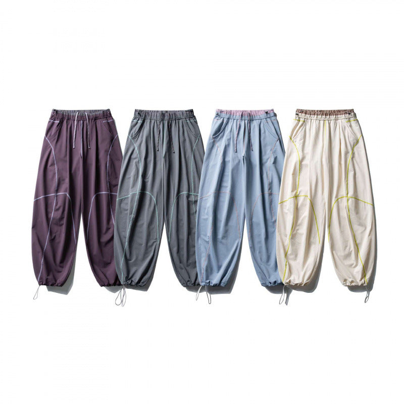 Unisex locker cut tech jogging pants with elastic waistband, distinctive flatlock seams and drawstring Mune Fashion