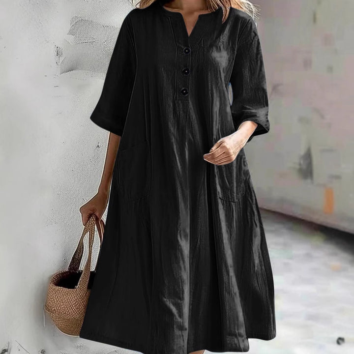 Women's casual falling A-line dress with V-neck button placket, 3/4 sleeves and patch pockets Mune Fashion