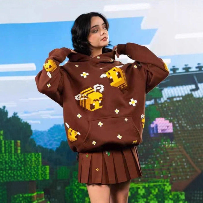 Unisex hoodie with woven pixel bee motif and attached kangaroo pocket Mune Fashion