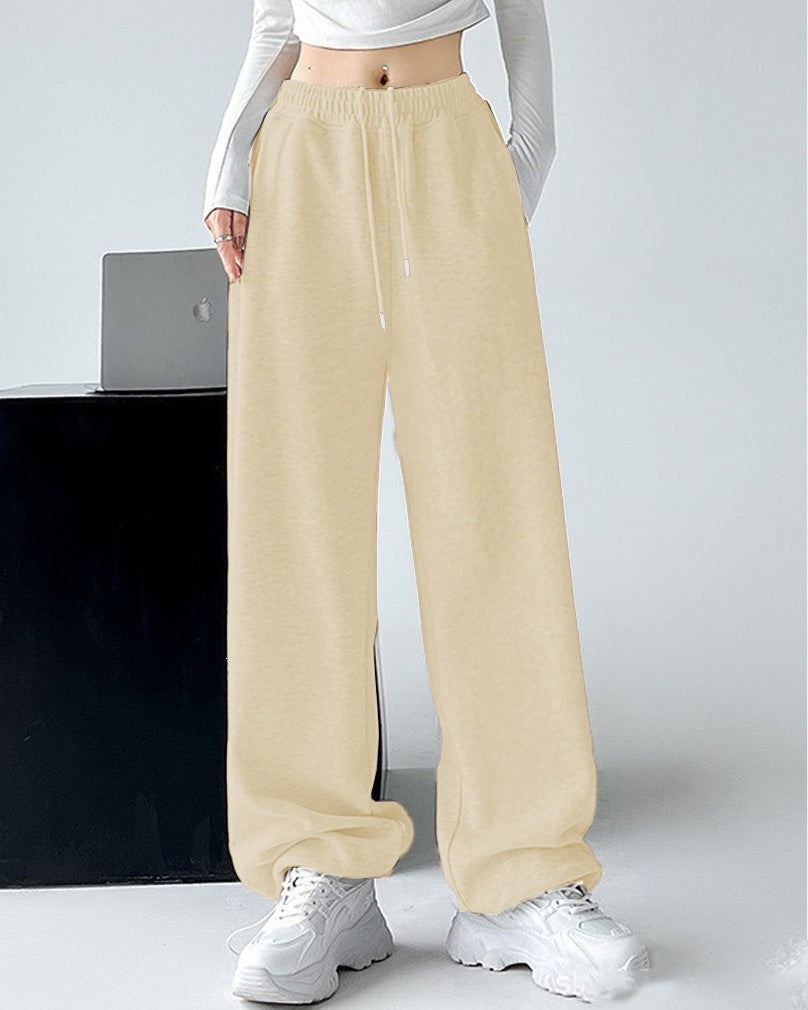 Ladies Nan extra wide palazzo sweatpants with high comfort waistband, side pockets, slit at hem and drawstring Mune Fashion