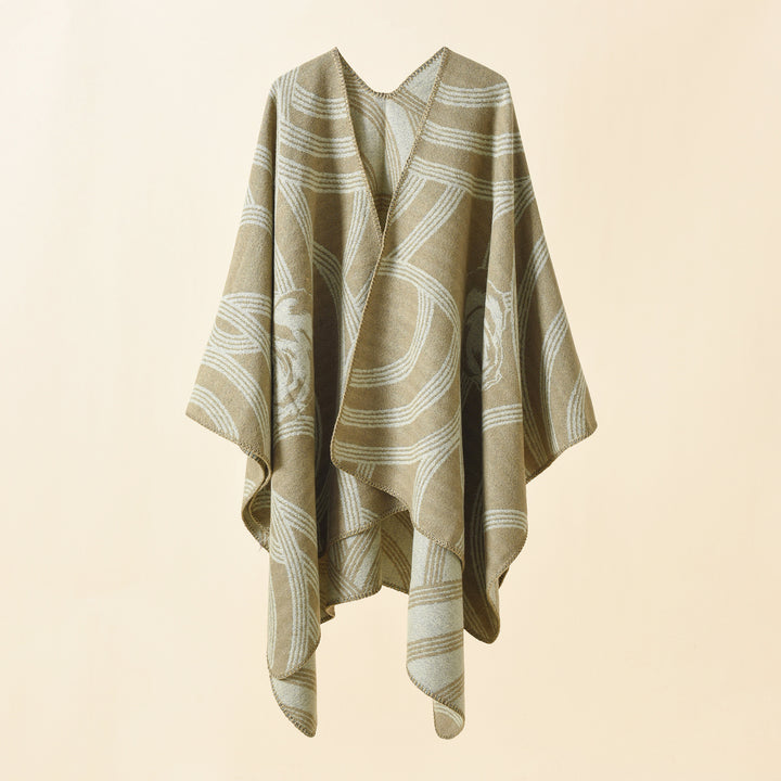 Ladies' collarless jacquard cape in a boxy oversized style with abstract medallion pattern