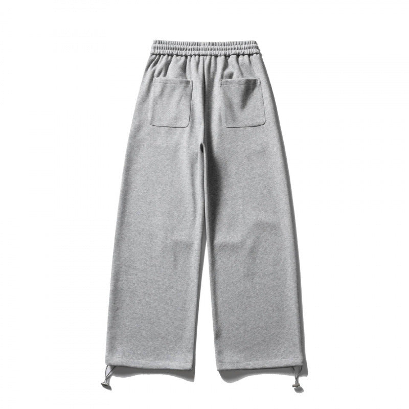 Unisex Wide Sweatpants with drawstring waistband, cord drawstring, and adjustable leg straps Mune Fashion