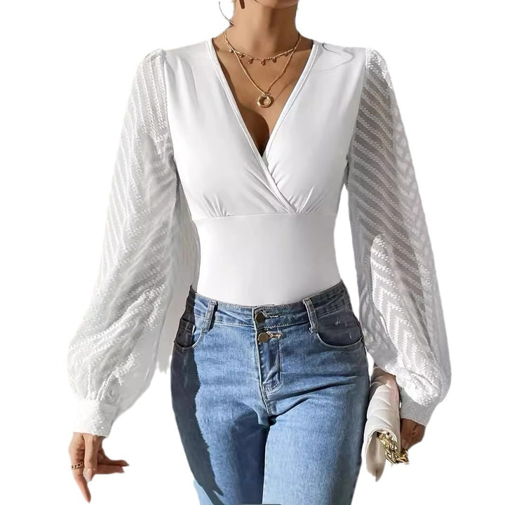 Women's tailored wrap body with deep V-neck and transparent, structured balloon sleeves Mune Fashion