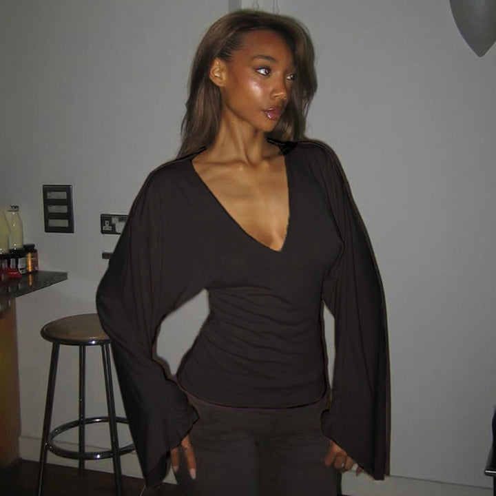 Women's tailored long sleeve cropped shirt with V-neck, dropped shoulder, and soft jersey quality Mune Fashion