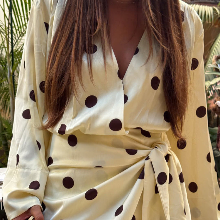 Ladies wrap mini dress with V-neck, bell sleeves and polka dot print Mune Fashion