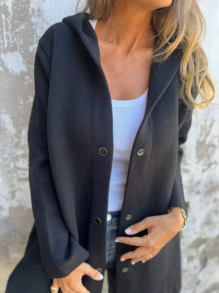 Women's hooded coat with snap button placket and straight oversized cut Mune Fashion