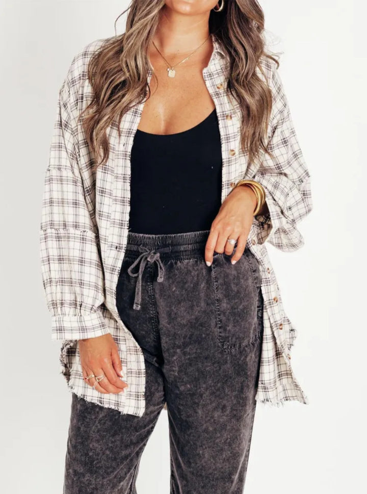Women's oversized check shirt with fringe trim, chest pockets, and loose fit Mune Fashion