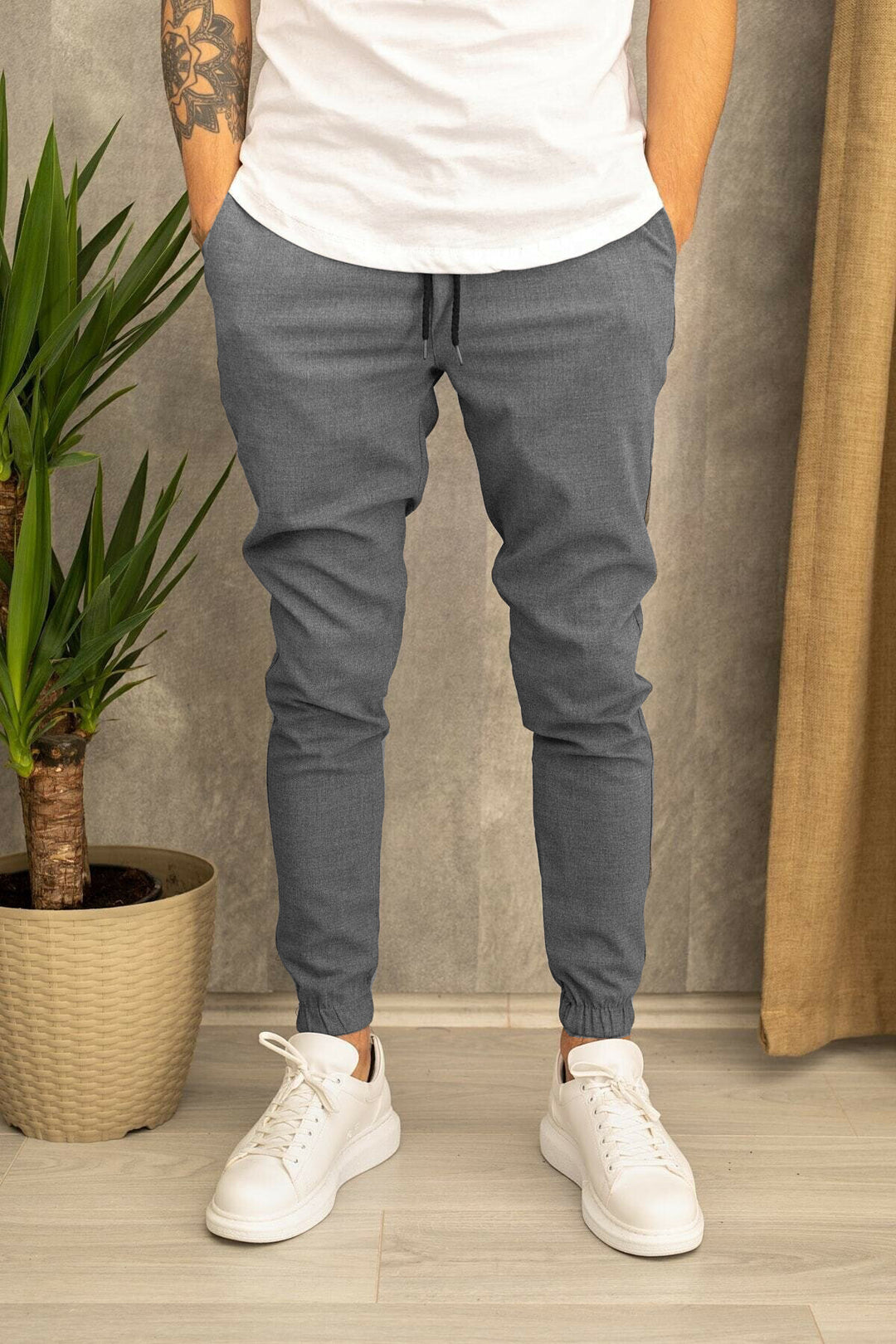 Men's slim fit jogging pants with elastic waistband, drawstring, and ribbed ankle cuff Mune Fashion