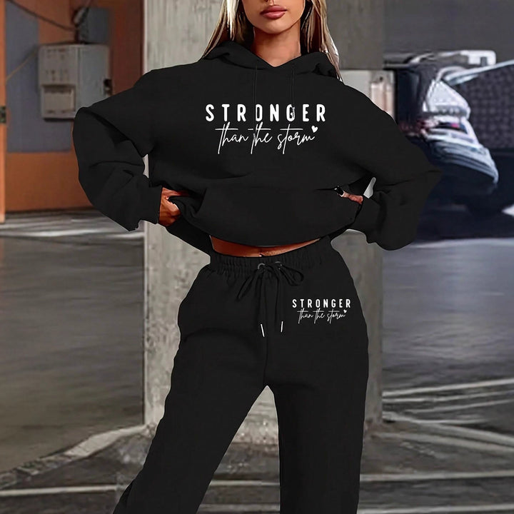 Women's cropped hoodie and jogging pants set with statement print, kangaroo pocket and elastic waistband Mune Fashion