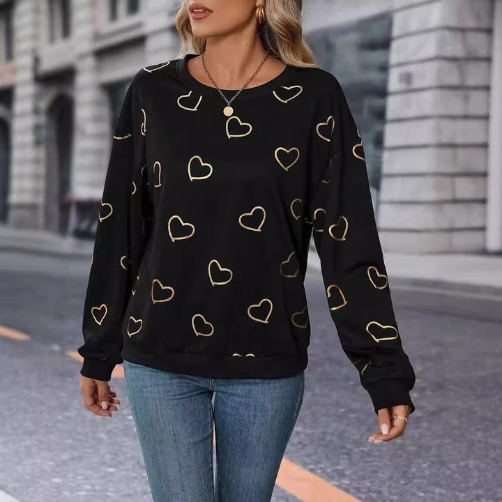Women's loose heart print sweatshirt with round neck and ribbed cuffs Mune Fashion
