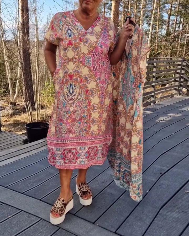 Women's airy V-neck dress in paisley print with side pockets and matching pareo Mune Fashion