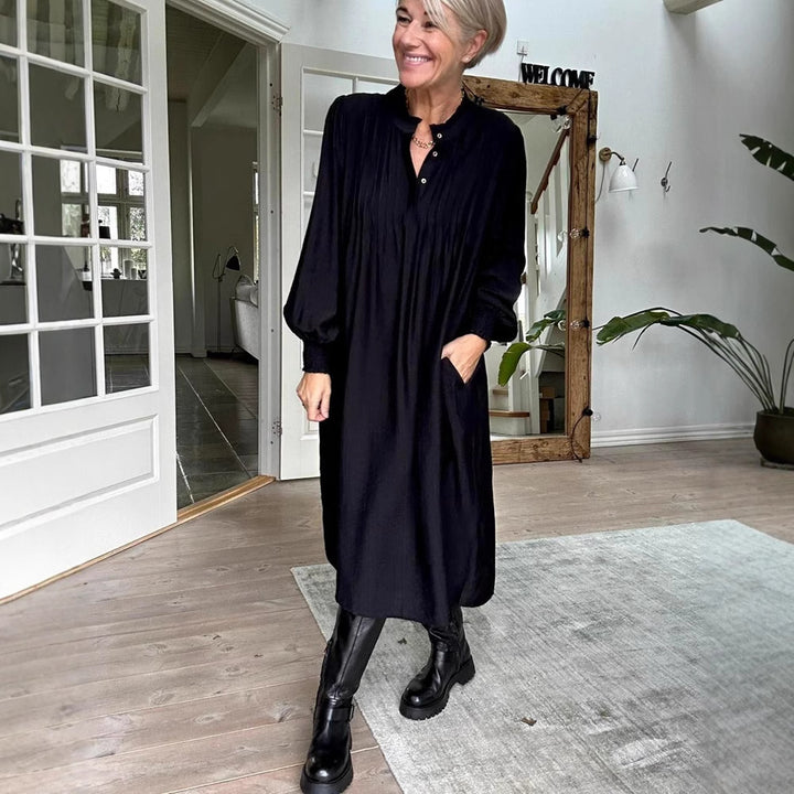 Ladies' loose midi dress with fine pleated look, stand-up collar, short button placket, smocked cuffs, and side pockets Mune Fashion