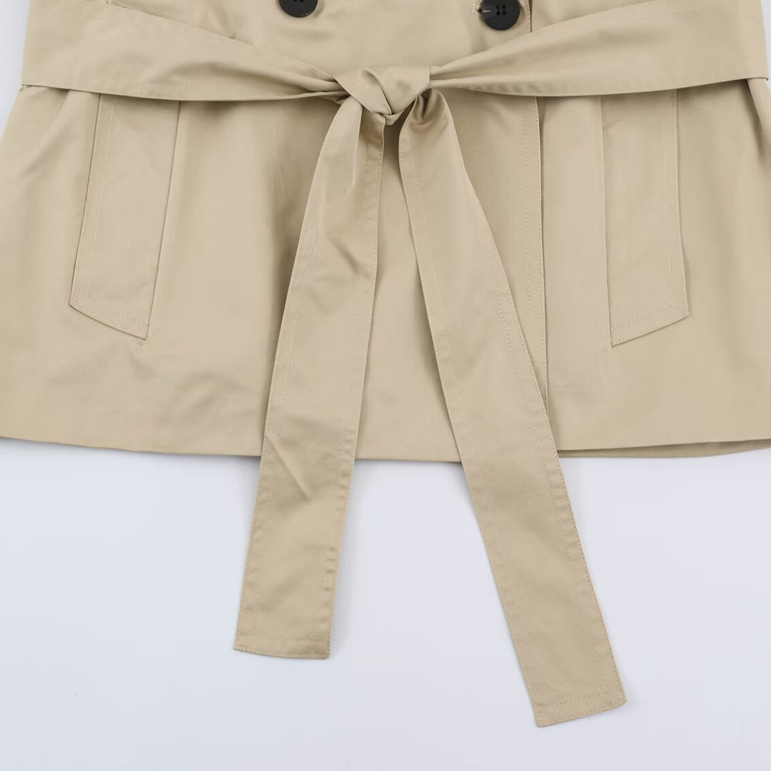 Women's short lightweight trench coat with tie belt, dropped shoulders and double button placket Mune Fashion