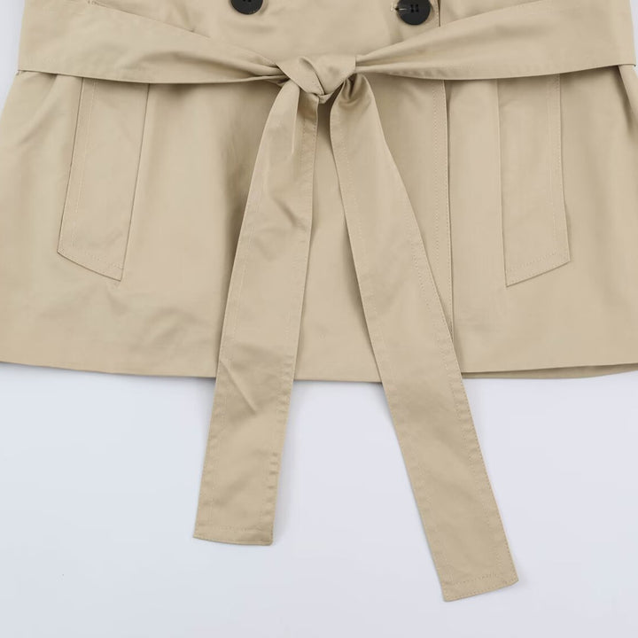 Women's short lightweight trench coat with tie belt, dropped shoulders and double button placket Mune Fashion