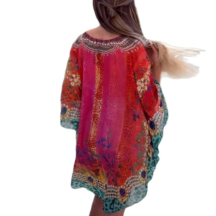 Women's short tunic kaftan with embellished V-neck and floral-animal border Mune Fashion