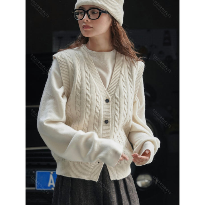 Women's chunky knit cable vest with deep V-neck and button placket Mune Fashion