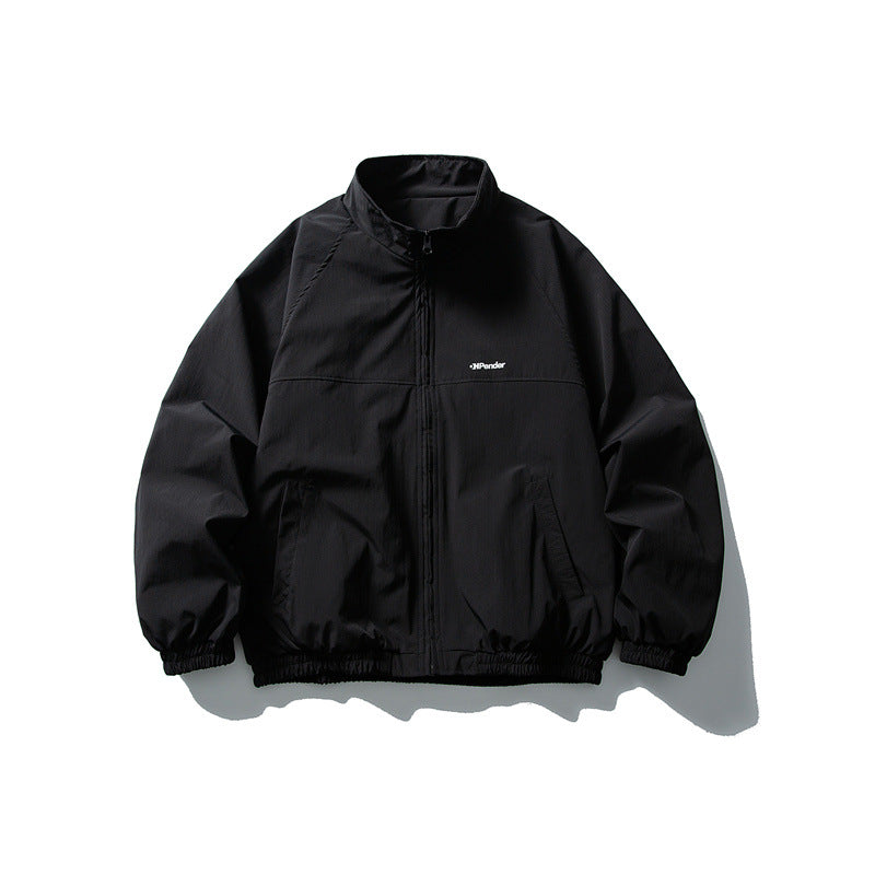 Unisex Lightweight water-repellent windbreaker with stand-up collar, raglan sleeves, and elastic hem Mune Fashion