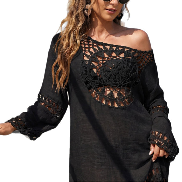 Women, elegant beach cover-up with crocheted pattern and tassels Mune Fashion