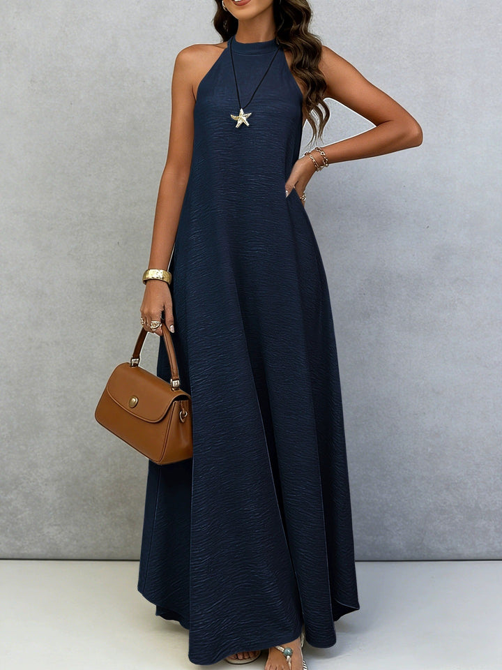 Women’s sleeveless maxi dress with high standing collar, flowing A-line and crepe texture Mune Fashion