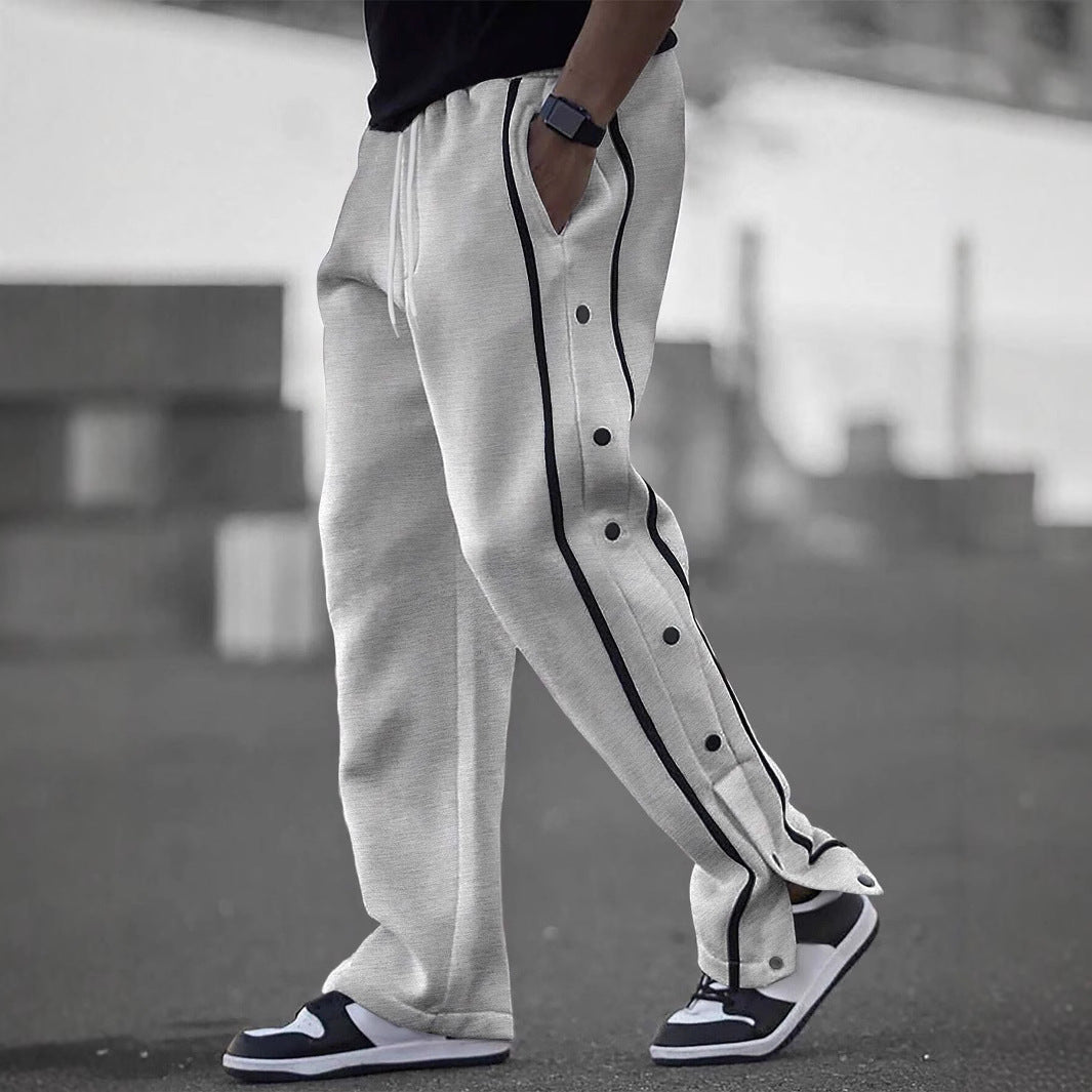 Men's casual training pants with side snap button placket, elastic waistband and contrasting piping Mune Fashion