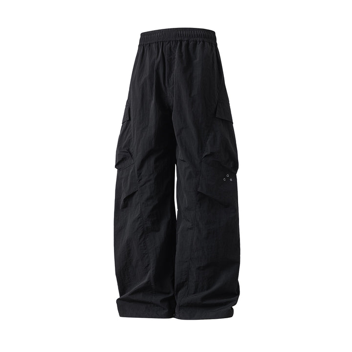 Unisex Wide Cargo Palazzo Pants made of technical crinkle nylon with elastic waistband Mune Fashion