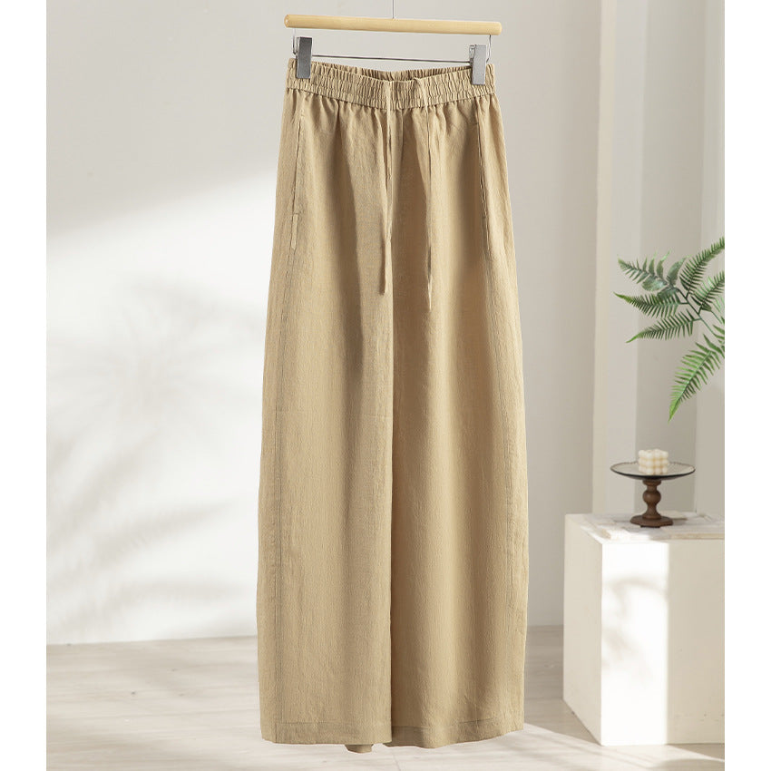 Women's wide linen look trousers with high elastic waistband and flowing wide leg silhouette Mune Fashion