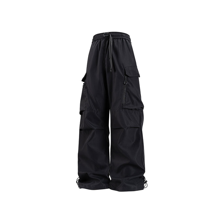 Unisex Wide technical cargo pants with multi-function pockets, drawstring and adjustable leg hems Drune