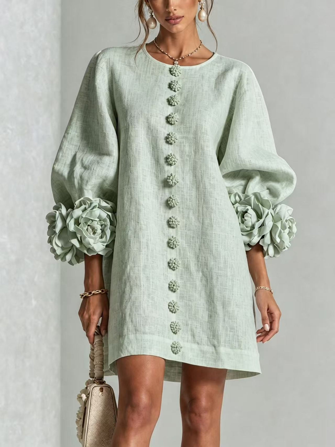 Women’s midi dress with voluminous puff sleeves, 3D flower button placket and linen texture Mune Fashion