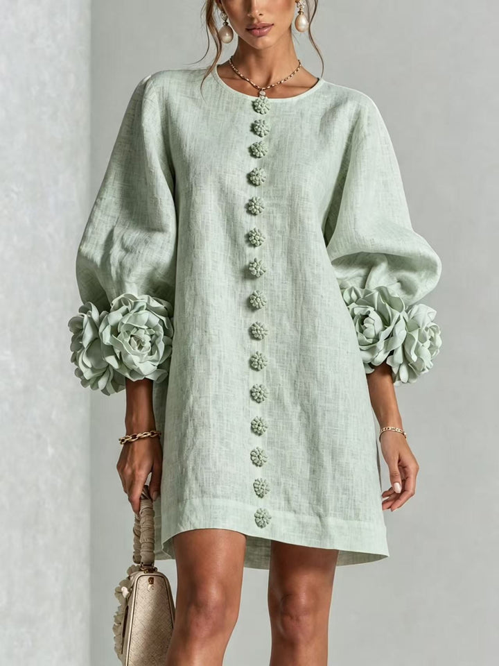 Women’s midi dress with voluminous puff sleeves, 3D flower button placket and linen texture Mune Fashion