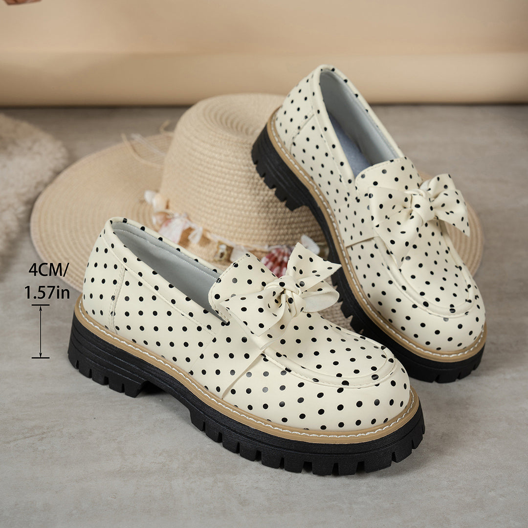 Women's casual loafers with polka dot pattern and decorative bow on a profiled platform sole Mune Fashion