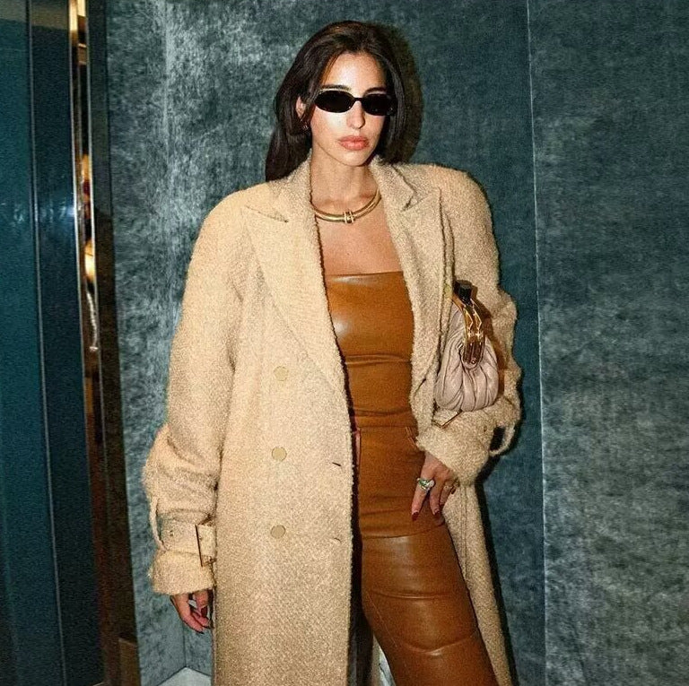 Women long cut bouclé teddy coat in oversized cut with double button front and adjustable sleeve straps Mune Fashion