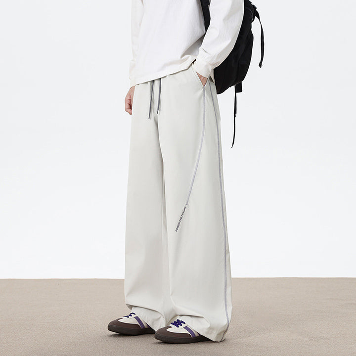 Men's Loose-Fitting Sports Pants with Reflective Details