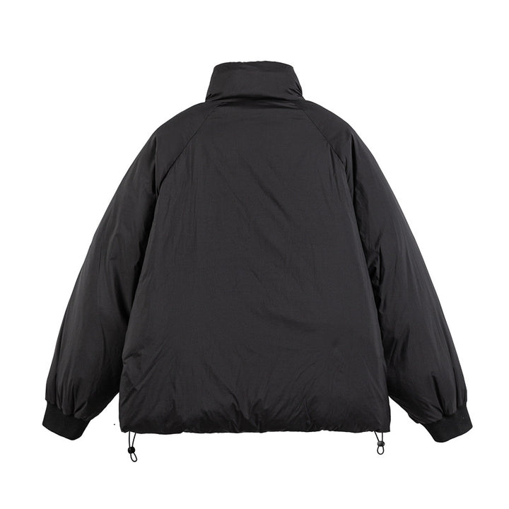 Unisex Boxy-padded short jacket with high stand-up collar, raglan sleeves and drawstring hem Mune Fashion