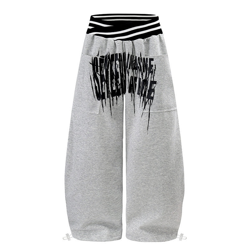 ladies culotte jogging pants with high-contrast waistband, patch pockets, and drawstring hem.