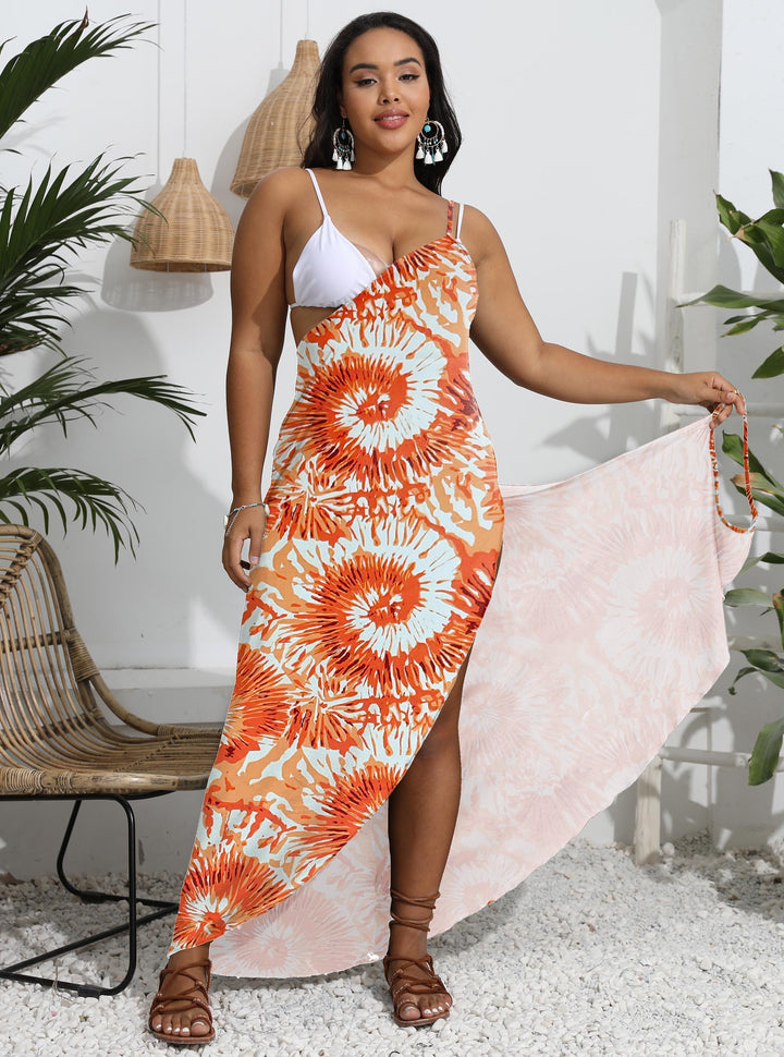 Women’s maxi dress with asymmetrical hem and floral pattern Mune Fashion