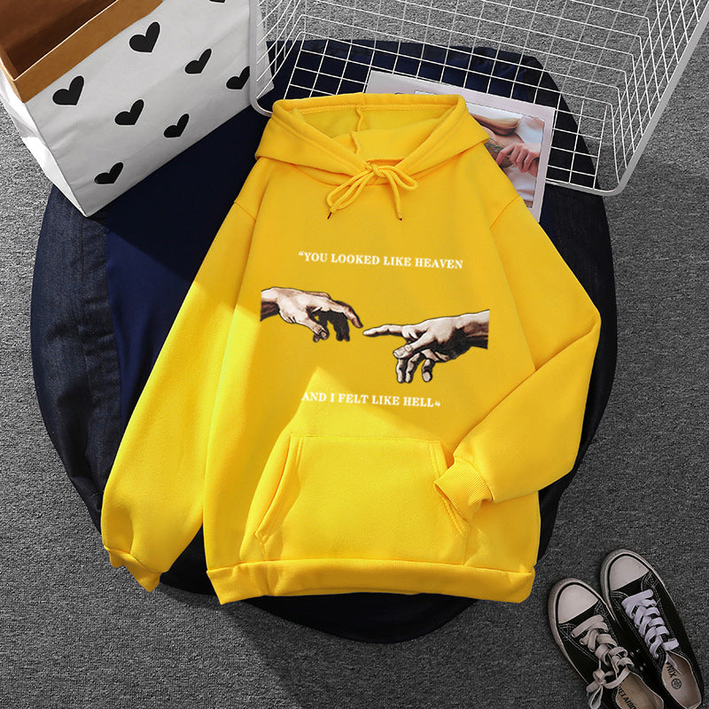 Women's oversized hoodie with kangaroo pocket and Renaissance hand design, soft fleece lining Mune Fashion