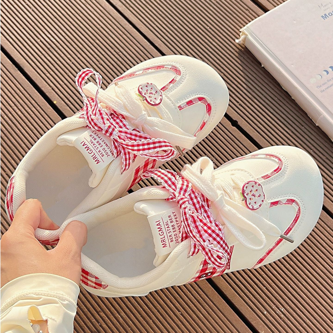 Women's sneakers with playful check pattern and decorative bows Mune Fashion