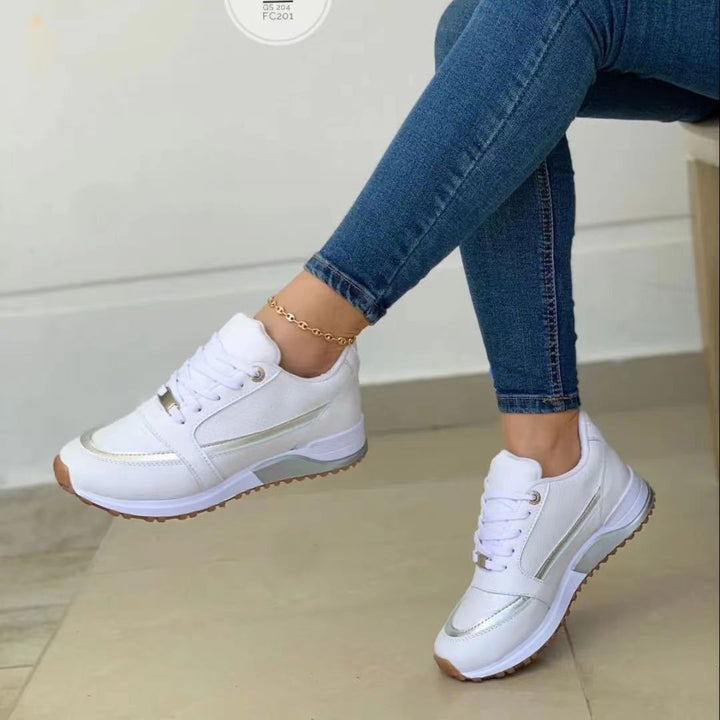 Women's sporty sneakers with elevated wedge sole, metallic decorative stripe and padded comfort insole Mune Fashion