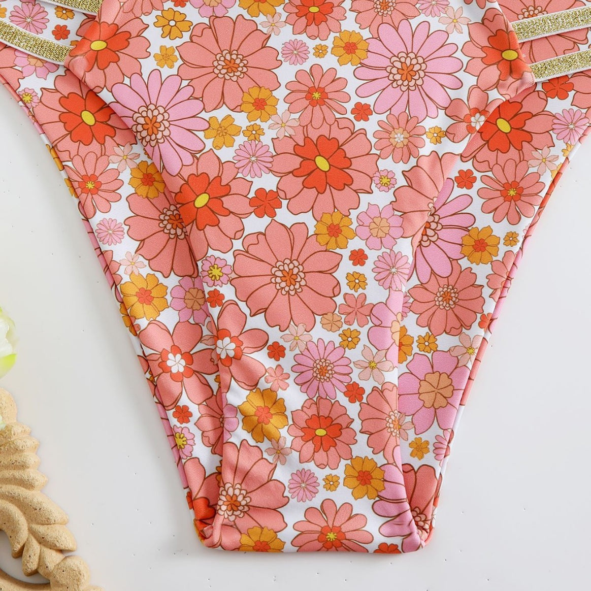 Women’s bikini set with floral design and golden accents Mune Fashion