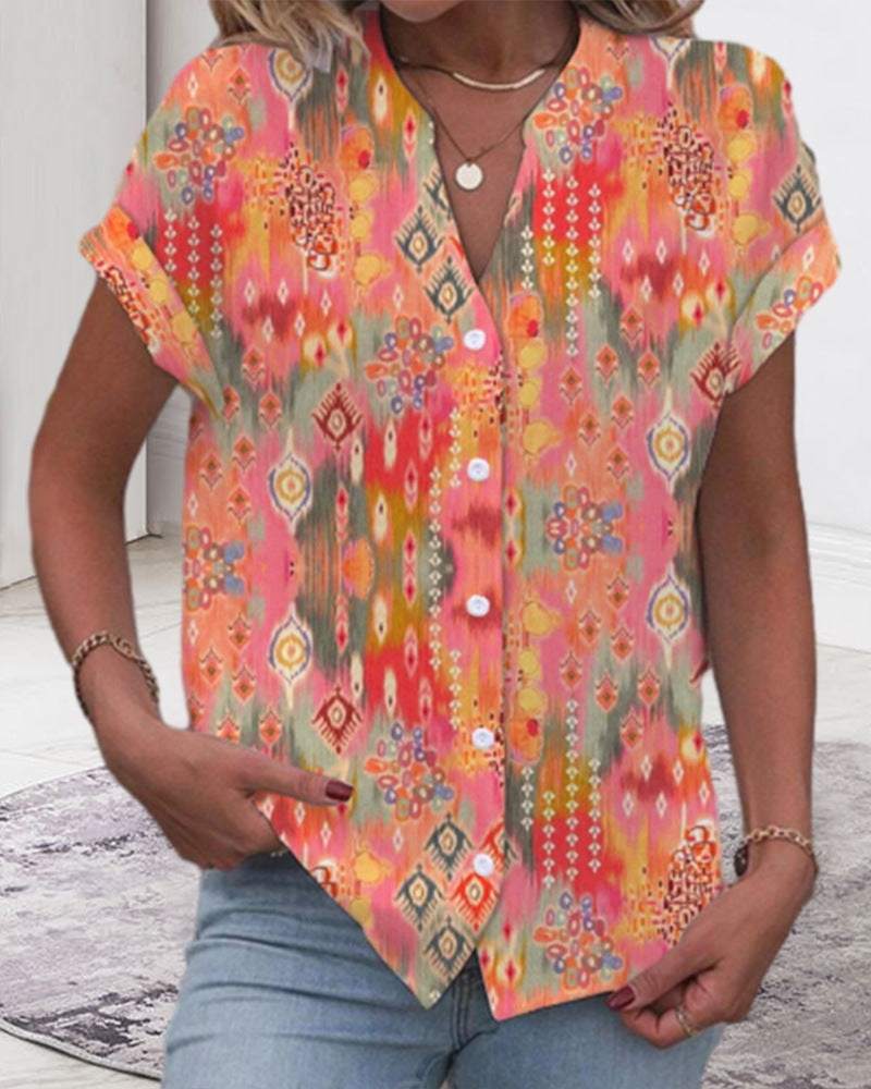 Women's casual short-sleeve blouse with V-neck, button placket and folk all-over print Mune Fashion