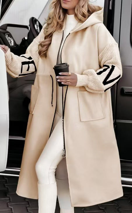 Women’s hooded coat with oversized cut, knitted sleeve cuffs and patch pockets Mune Fashion