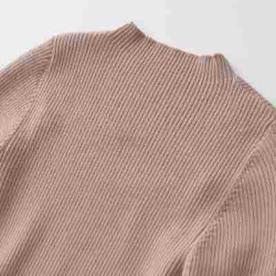 Women's Ribbed Stretch Fine Knit Sweater with Chest Cut-Out and Decorative Buttons Mune Fashion