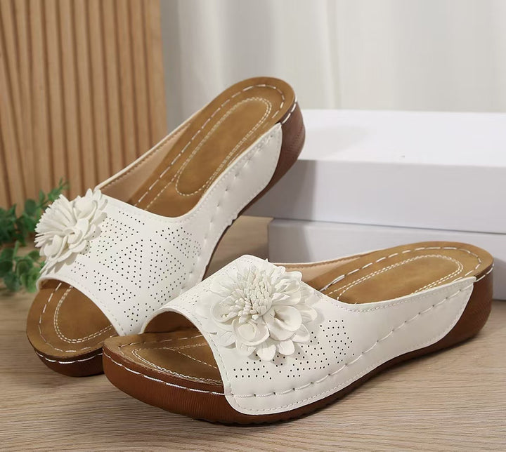 Women's Perforated Wedge Sandals as Slip-On with Flower Application and Padded Footbed Mune Fashion